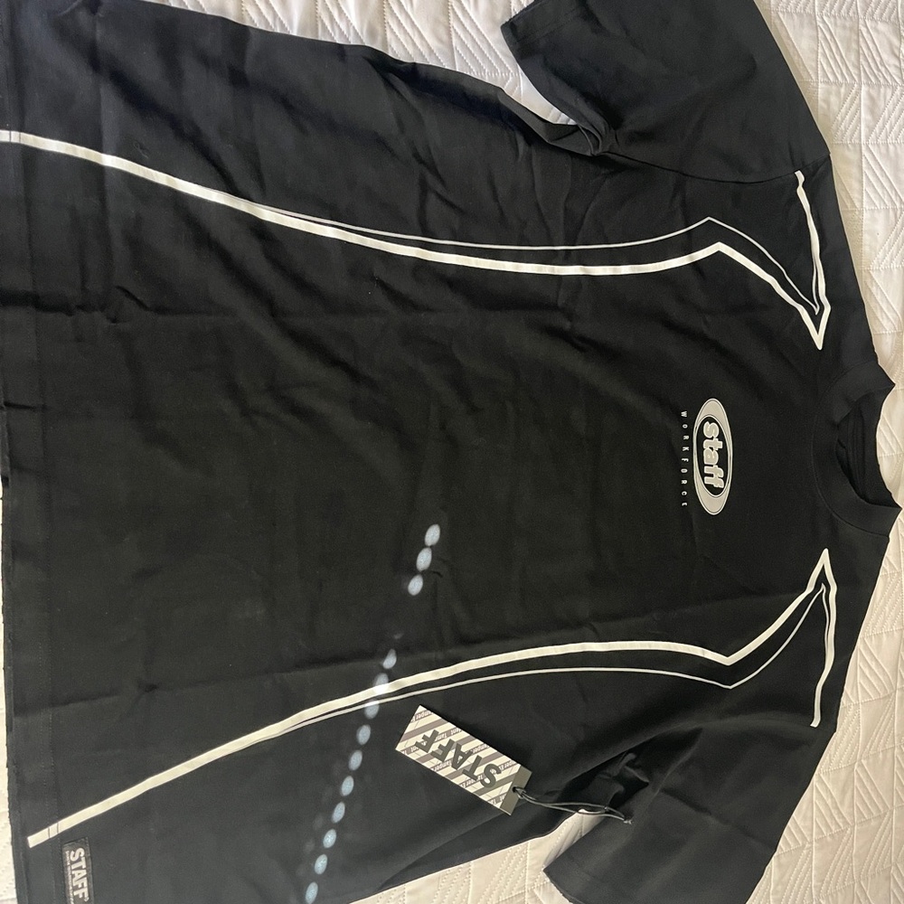 First never last tee